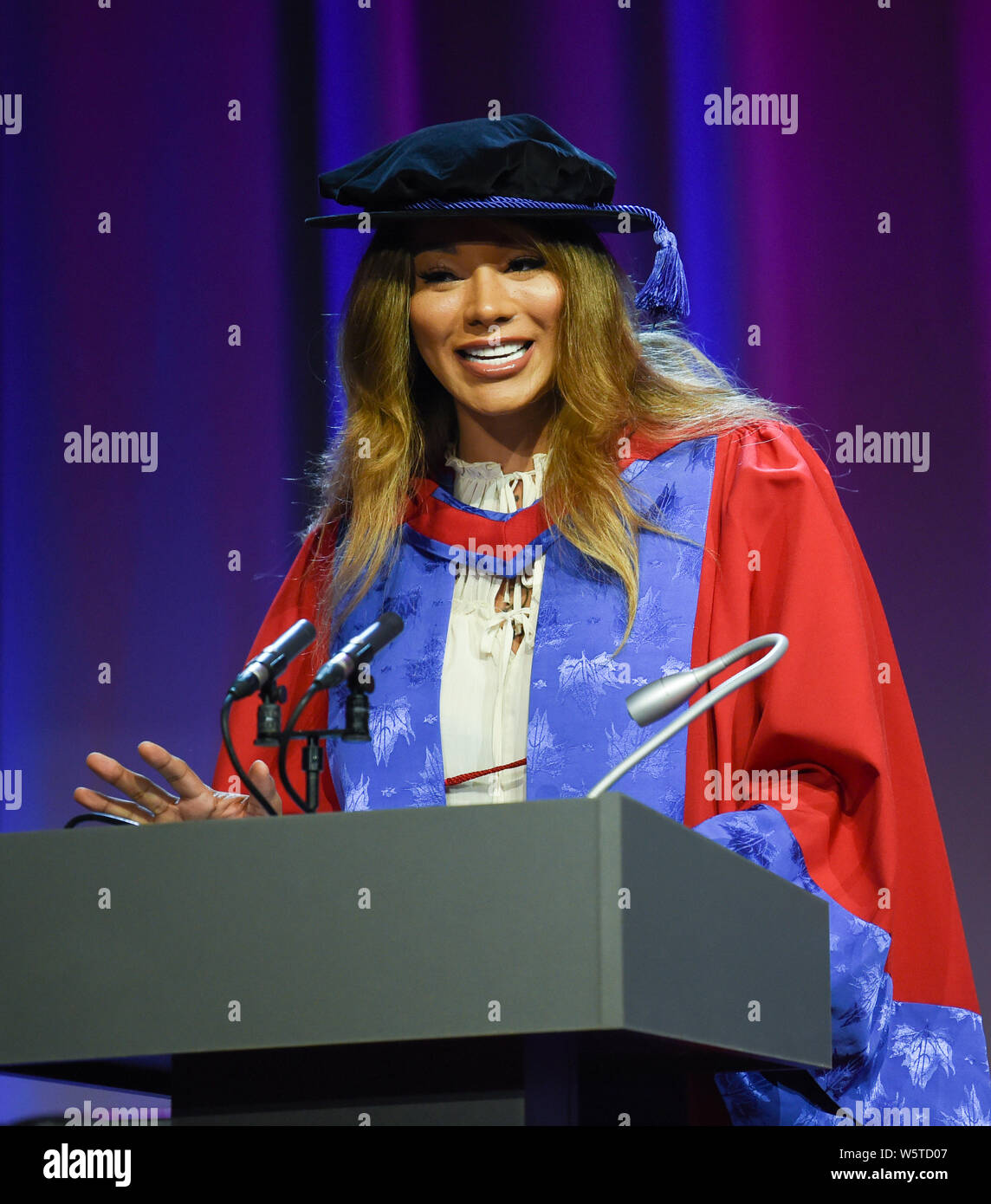 Brighton UK 30th July 2019 - Famous transgender model  Munroe Bergdorf speaking after receiving an honorary doctor of letters at the University of Brighton graduation ceremony today from Vice-Chancellor Professor Debra Humphris . Credit : Simon Dack / Alamy Live News Stock Photo