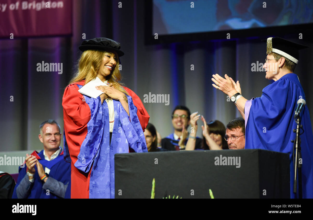 Brighton UK 30th July 2019 - Famous transgender model and activist Munroe Bergdorf receiving an honorary doctor of letters at the University of Brighton graduation ceremony today from Vice-Chancellor Professor Debra Humphris held in the Brighton Centre. Credit : Simon Dack / Alamy Live News Stock Photo
