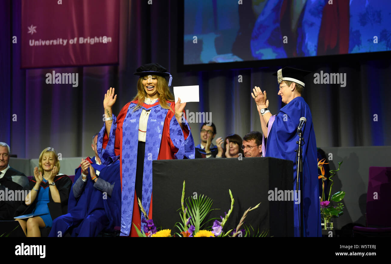 Brighton UK 30th July 2019 - Famous transgender model and activist Munroe Bergdorf receiving an honorary doctor of letters at the University of Brighton graduation ceremony today from Vice-Chancellor Professor Debra Humphris held in the Brighton Centre. Credit : Simon Dack / Alamy Live News Stock Photo