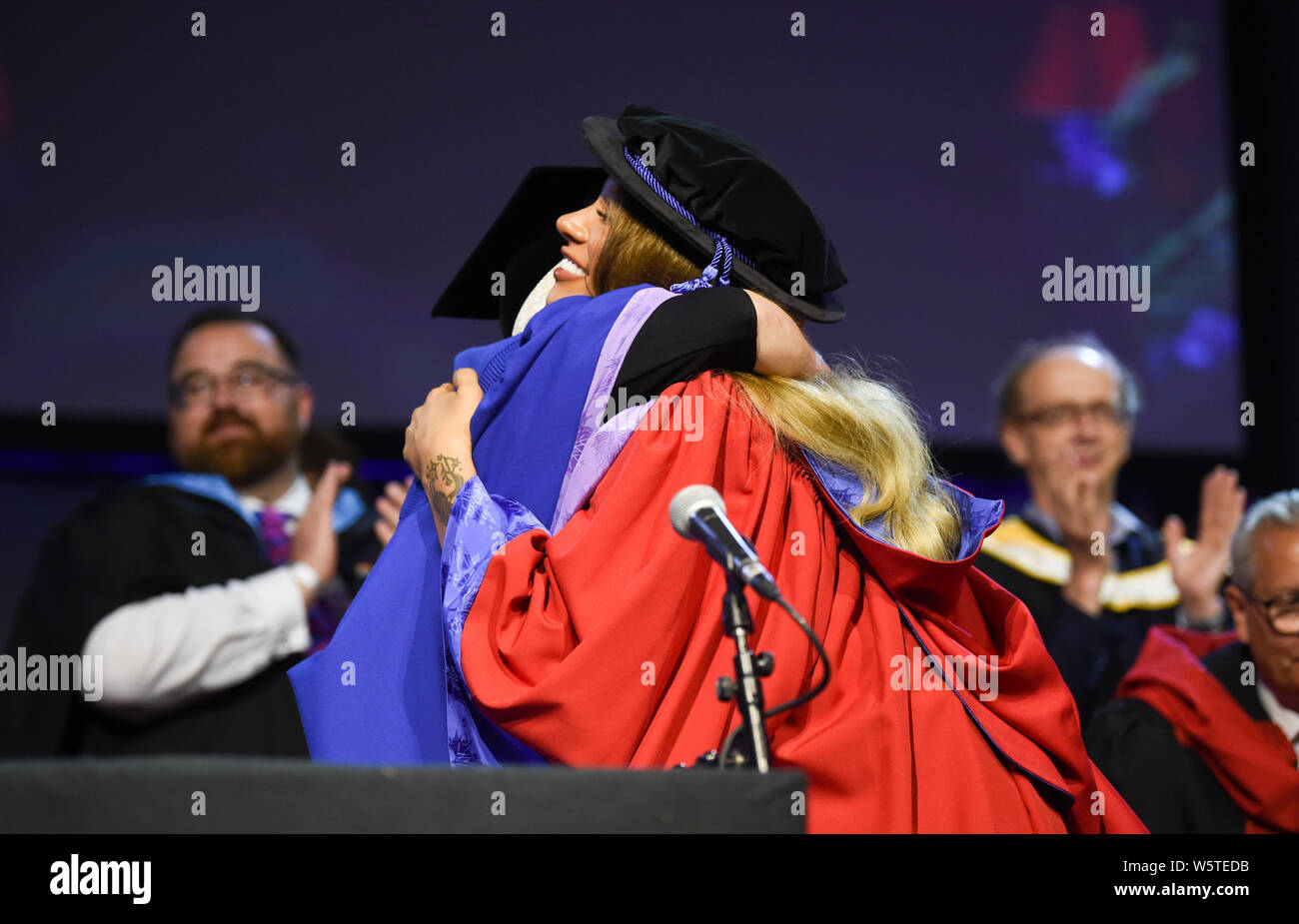 Brighton UK 30th July 2019 - Famous transgender model  Munroe Bergdorf receiving an honorary doctor of letters at the University of Brighton graduation ceremony today from Vice-Chancellor Professor Debra Humphris . Credit : Simon Dack / Alamy Live News Stock Photo