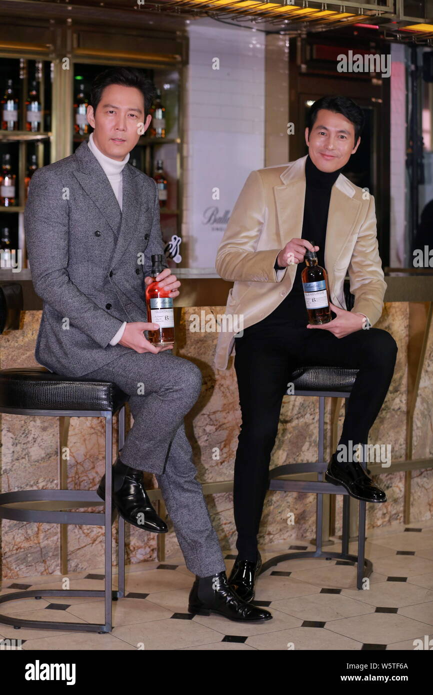 South Korean actor Jung Woo-sung, right, and Lee Jung-jae attend a promotional event in Seoul, South Korea, 6 December 2018. Stock Photo