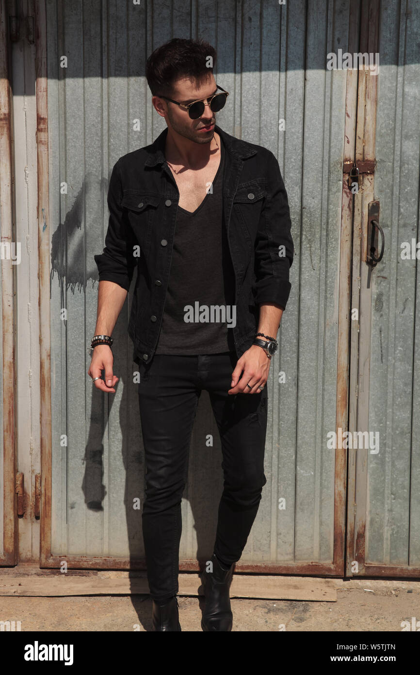 man wearing black shirt and sunglasses 