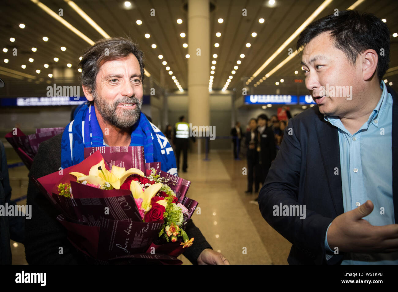 Spanish football manager Quique Sanchez Flores of Shanghai Greenland Shenhua FC is pictured after arriving at the Shanghai Pudong International Airpor Stock Photo