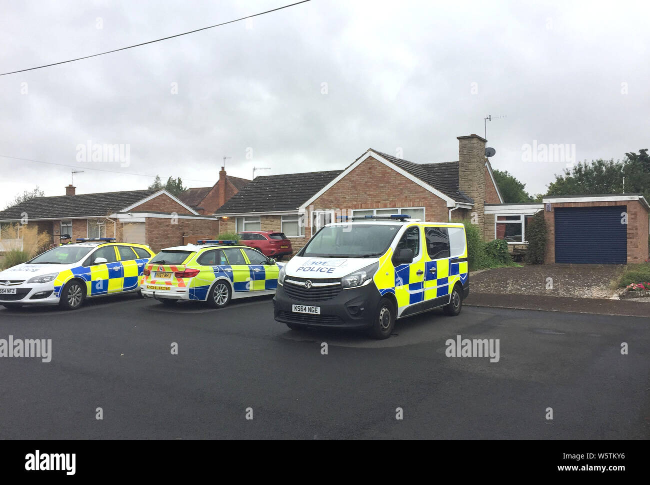 West Mercia Police officers searching a house in Kempsey, Worcestershire after female human remains were found in a septic tank on July 12. Stock Photo