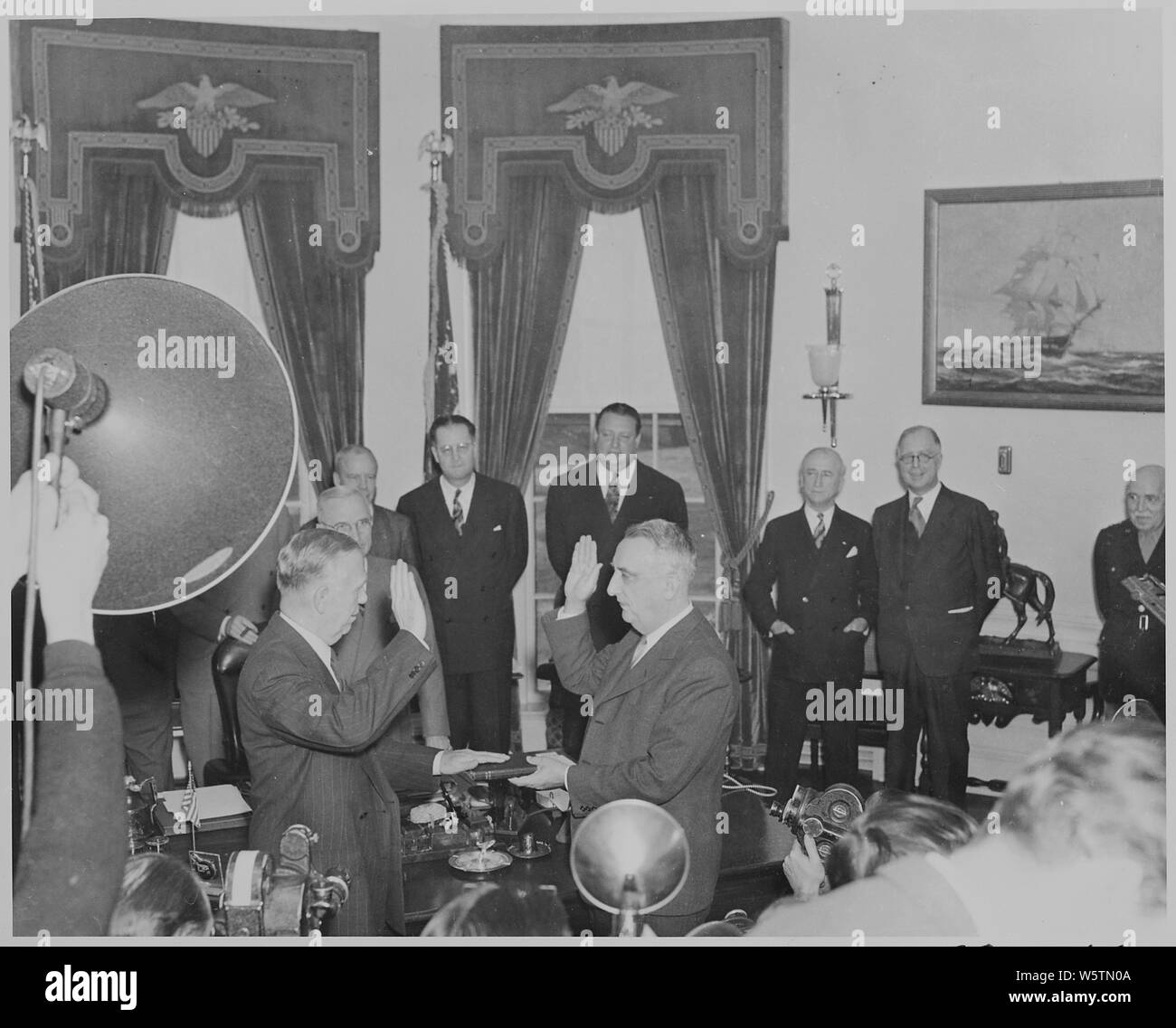 Photograph of George C. Marshall being sworn in as Secretary of State