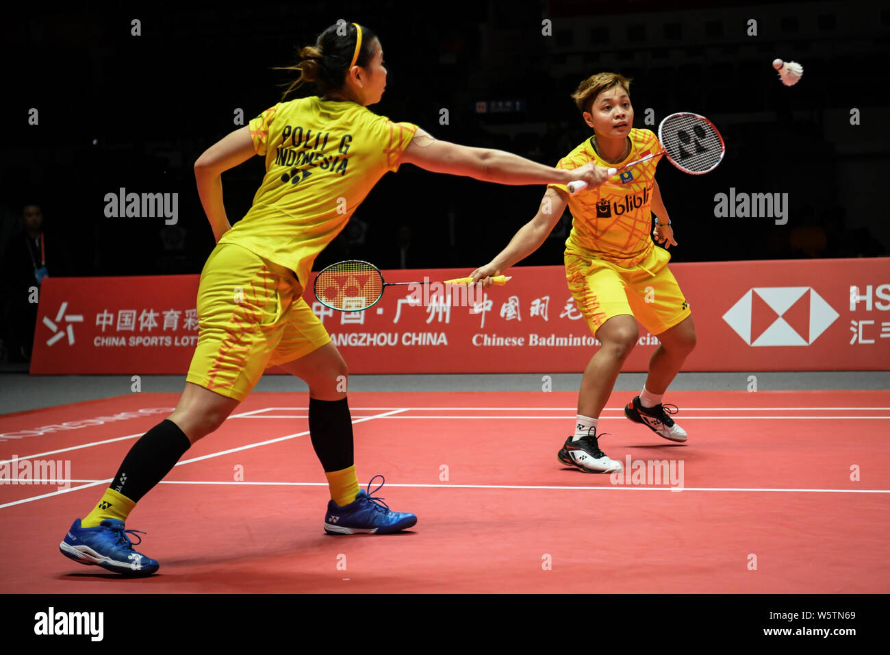 Greysia Polii And Apriyani Rahayu Of Indonesia Return A Shot To Misaki Matsutomo And Ayaka Takahashi Of Japan In Their Women S Doubles Group A Match D Stock Photo Alamy