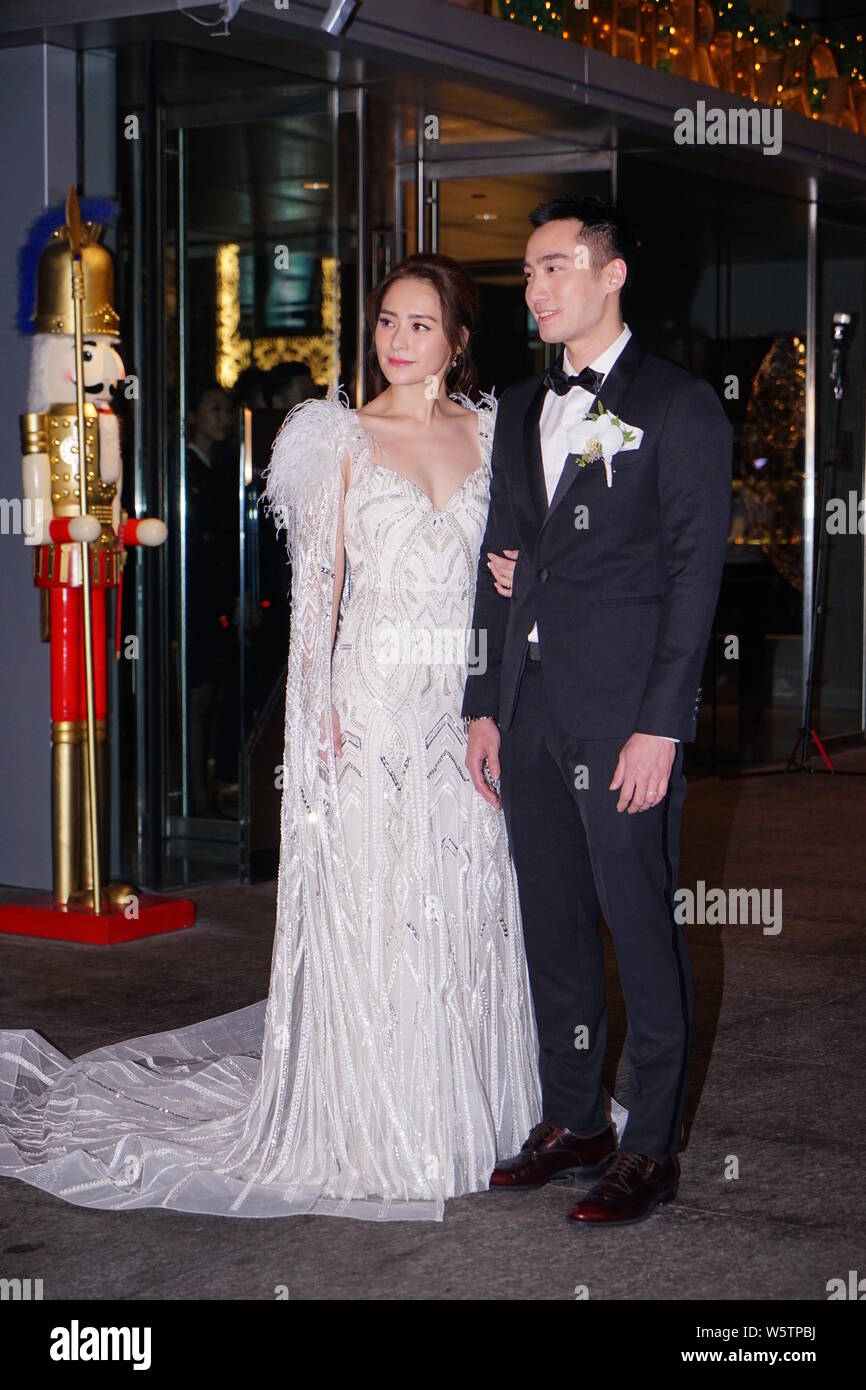 Hong Kong singer and actress Gillian Chung of pop duo Twins and her husband Michael Lai pose for a photo before their wedding ceremony in Hong Kong, C Stock Photo