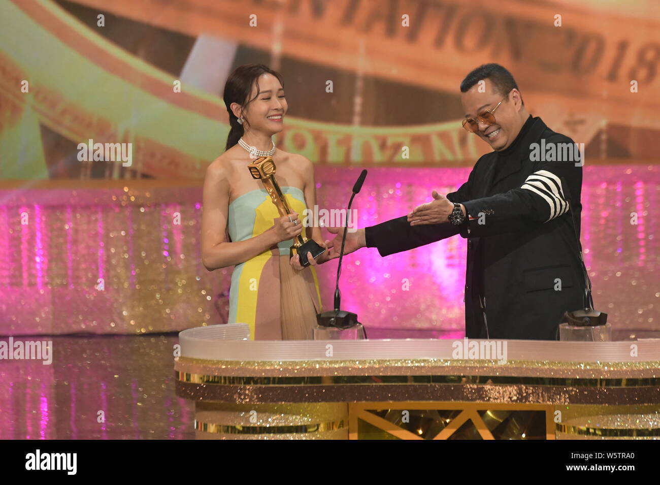 Hong Kong actress Ali Lee poses with her trophy of the Best Actress