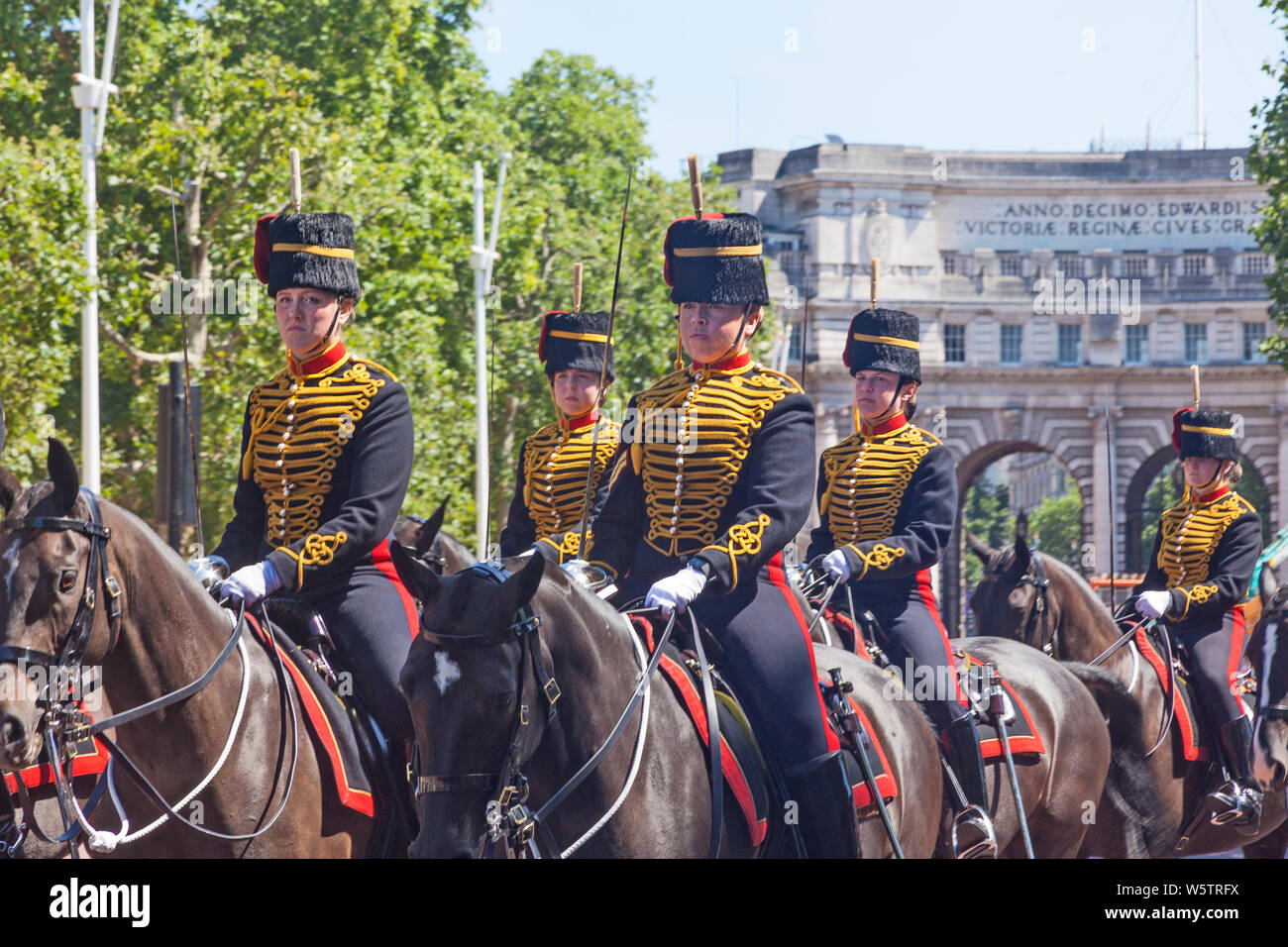 All-female troopers of the King's Troop, Royal Horse Artillery turning into The Mall after the Changing of the Guard at Horse Guards Parade, Stock Photo
