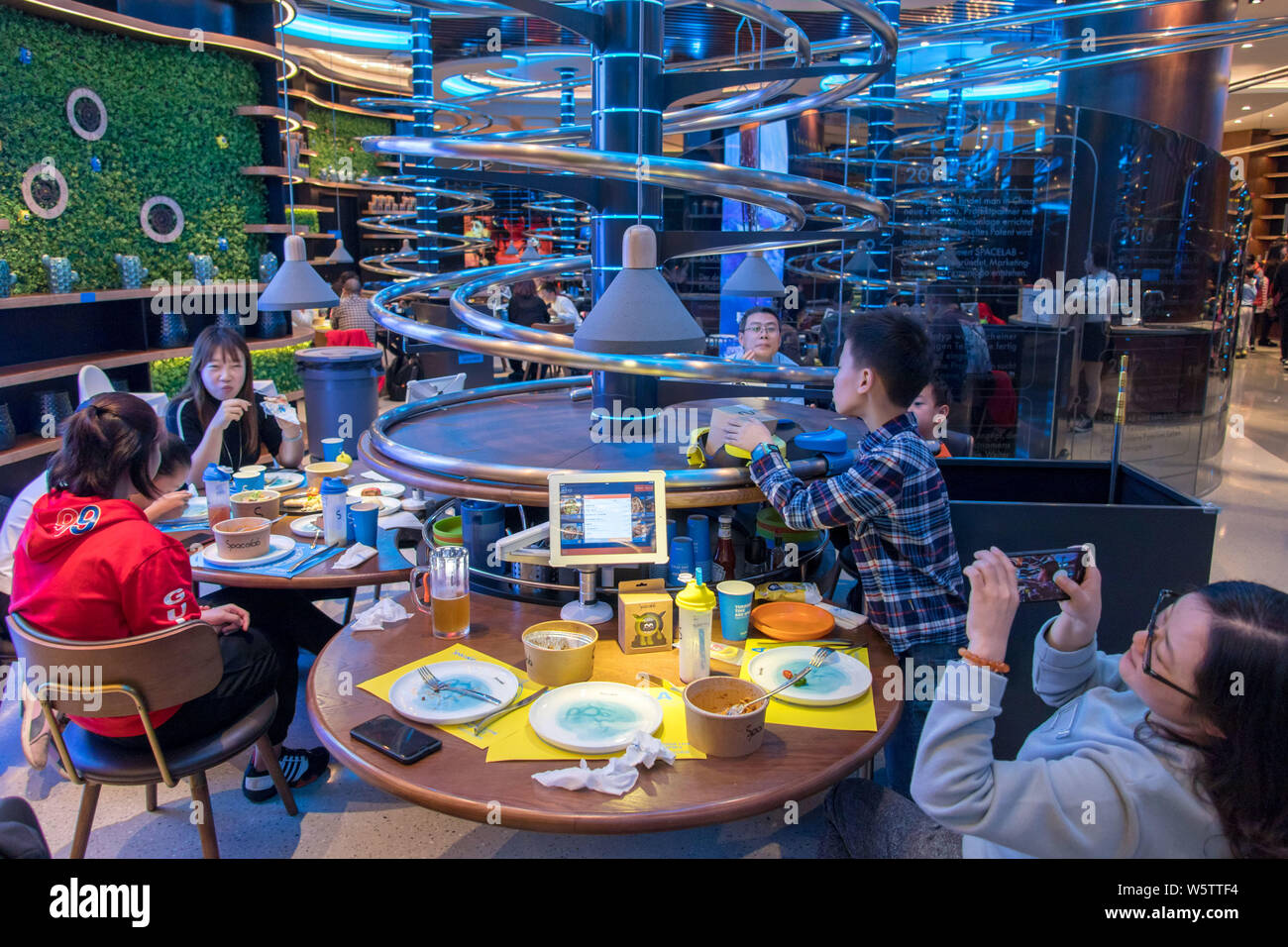 Customers dine in the world's tenth and Asia's third spaceship-themed ...