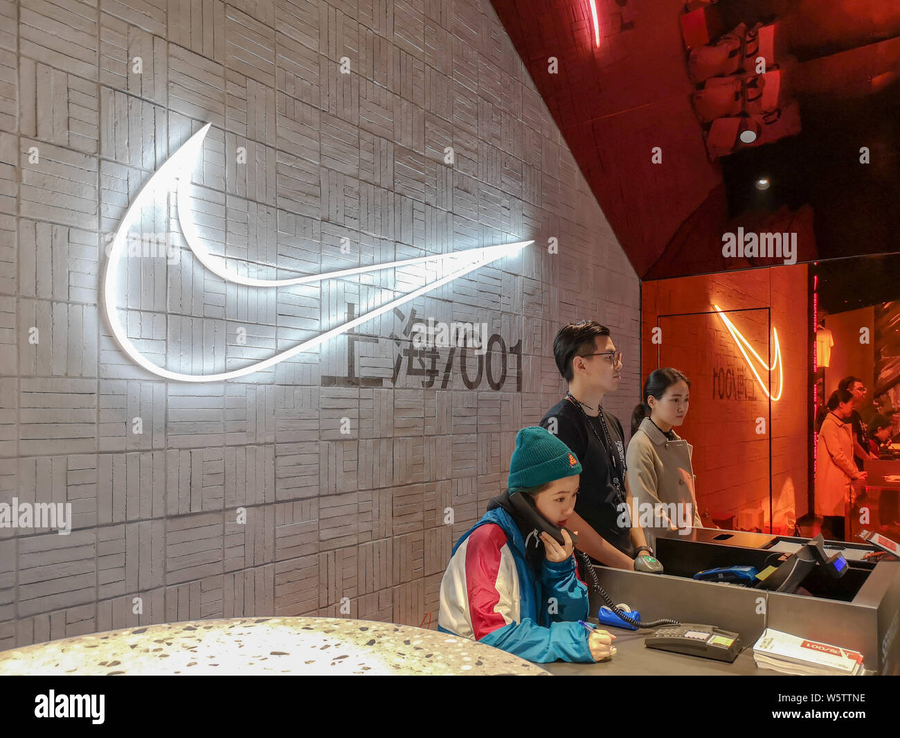 FILE--Employees are pictured at the Nike Shanghai House of Innovation in  Shanghai, China, 22 October 2018. China has become the most rapidly expa  Stock Photo - Alamy