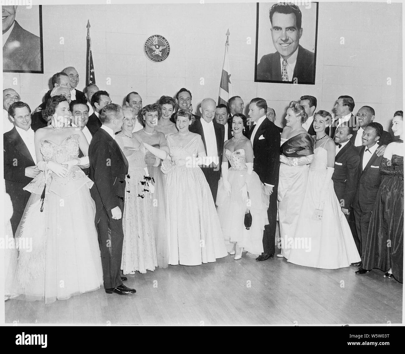 Photograph of President Dwight D. Eisenhower and his wife Mamie with other guests at the Inaugural ball. Stock Photo