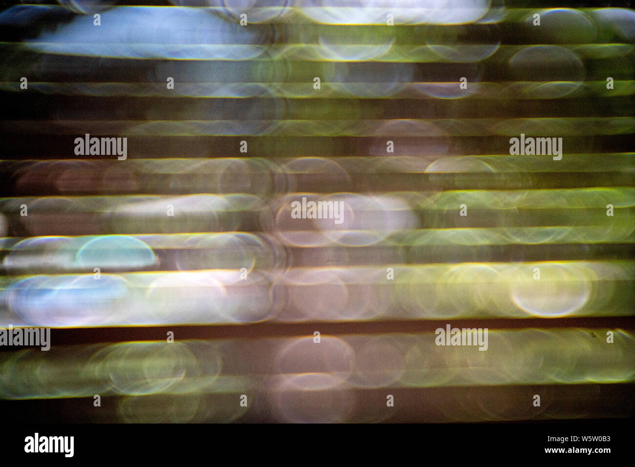 roll-up shutter bubble bokeh background Stock Photo