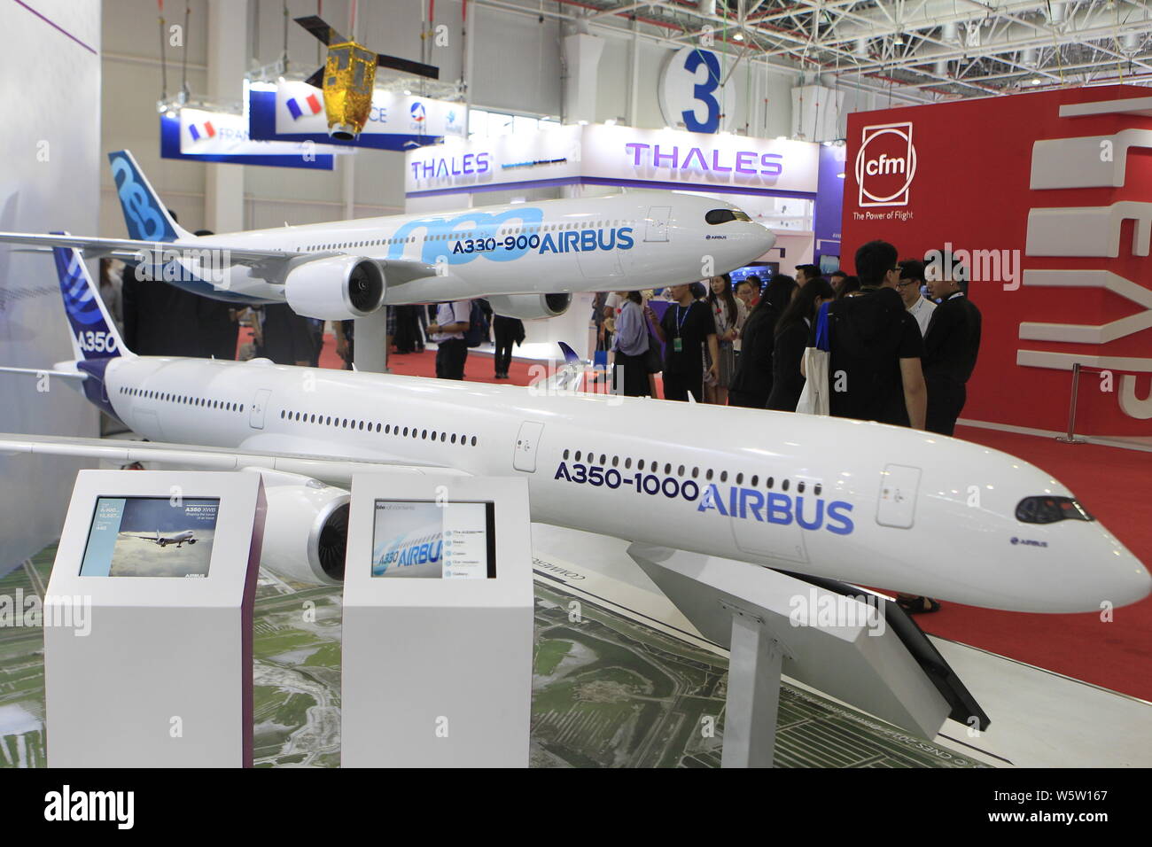 --FILE--Models of Airbus A350-1000 and A330-900 jet planes are displayed during the 12th China International Aviation and Aerospace Exhibition, also k Stock Photo