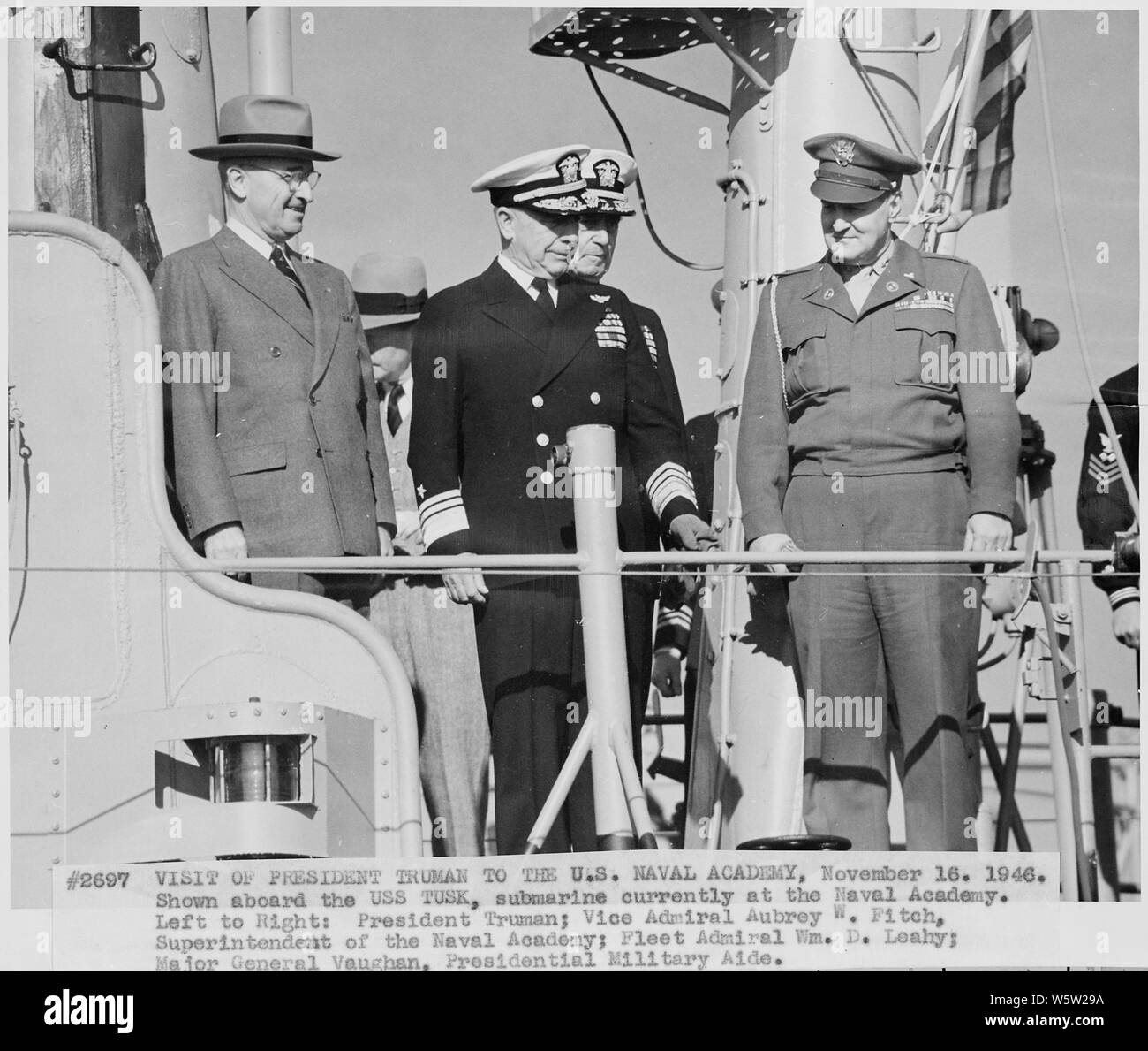 https://c8.alamy.com/comp/W5W29A/photograph-of-president-truman-aboard-a-submarine-the-uss-tusk-during-his-visit-to-the-us-naval-academy-left-to-right-the-president-vice-admiral-aubrey-fitch-superintendent-of-the-naval-academy-fleet-admiral-william-leahy-chief-of-staff-to-the-commander-in-chief-and-general-harry-vaughan-military-aide-to-the-president-W5W29A.jpg