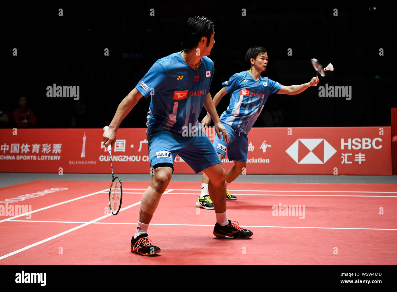 Hiroyuki Endo and Yuta Watanabe of Japan celebrate after defeating Li Junhui and Liu Yuchen of