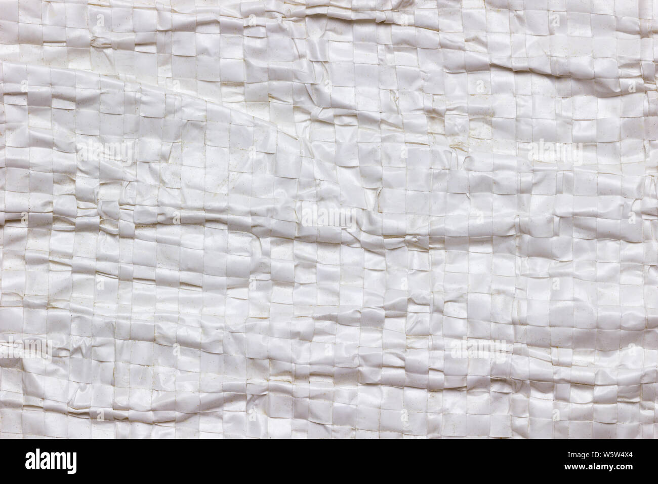 Texture and Wrinkles of white plastic net bag. Concept of recycle