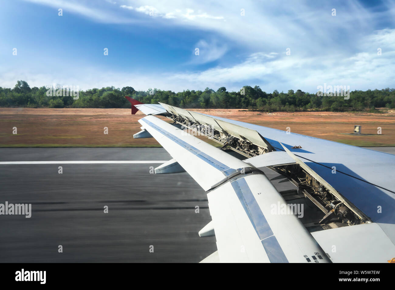 Airplane landing from window hi-res stock photography and images - Alamy