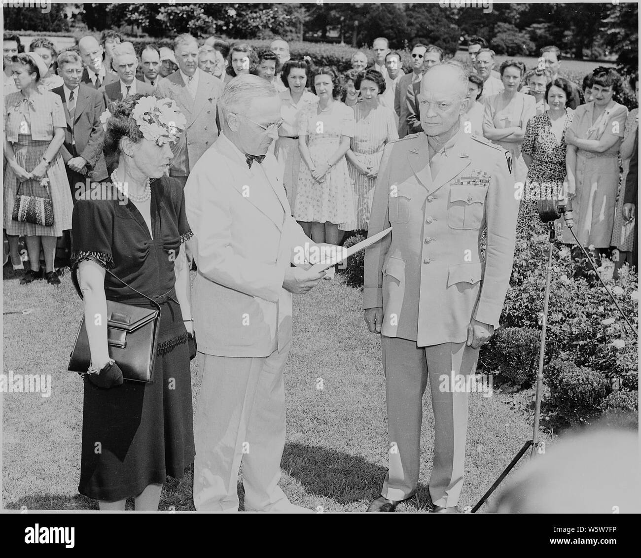 Photograph Of President Truman Reading The Citation For General Dwight D Eisenhower S Distinguished Service Medal While The General And Mrs Eisenhower Look On Stock Photo Alamy