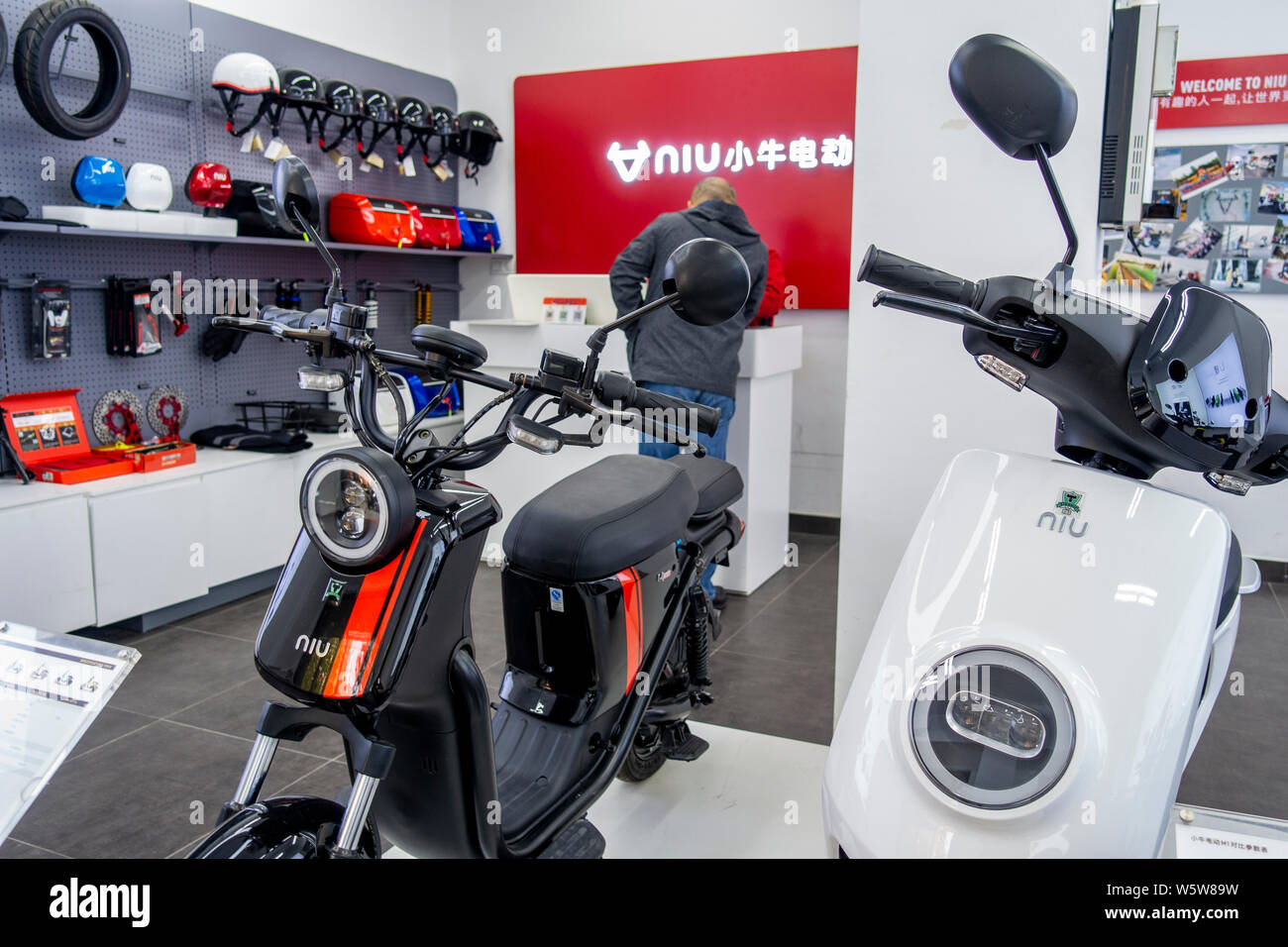 FILE--Electric bikes are for sale at a store of Niu Technologies, a  Beijing-based maker of electric scooter, in Shanghai, China, 24 October  2018 Stock Photo - Alamy