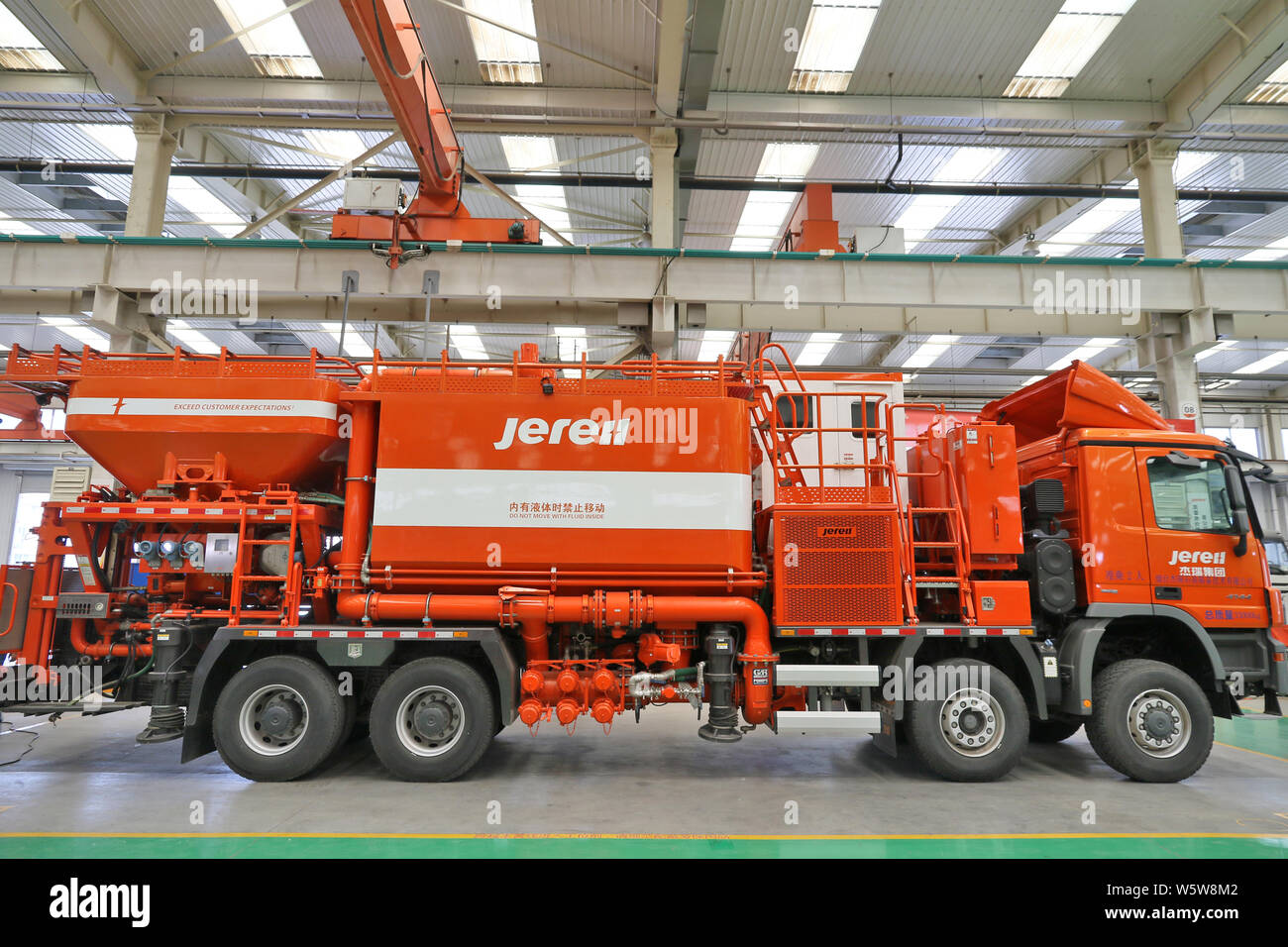 FILEChinese workers produce vehiclemounted oil and gas equipment