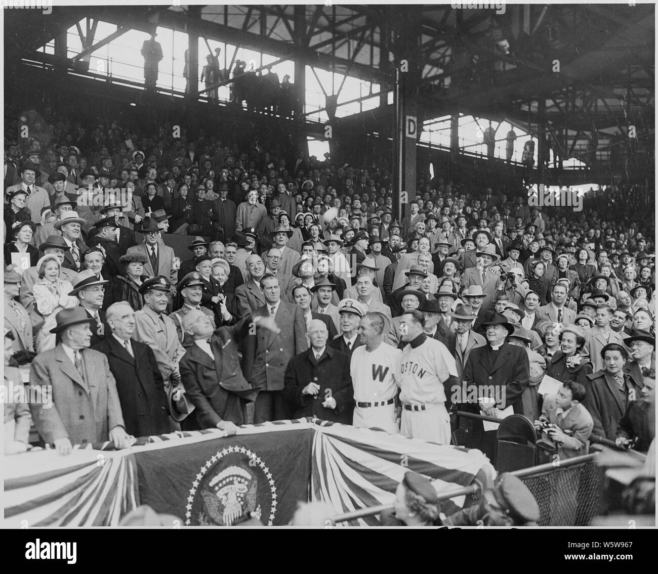 Photograph of President Truman throwing out the first ball to launch