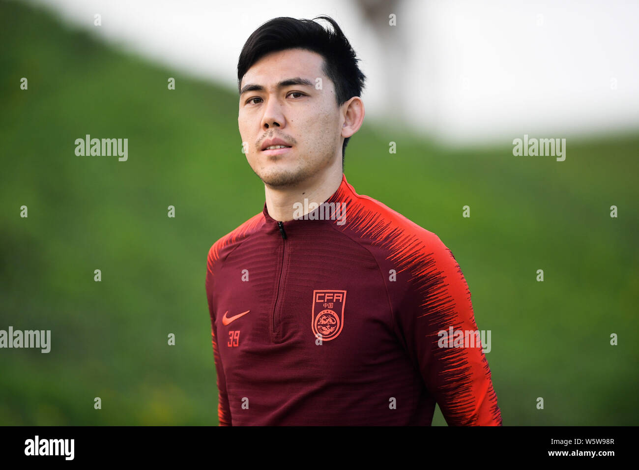 Li Xuepeng of the Chinese national men's football team takes part in a ...