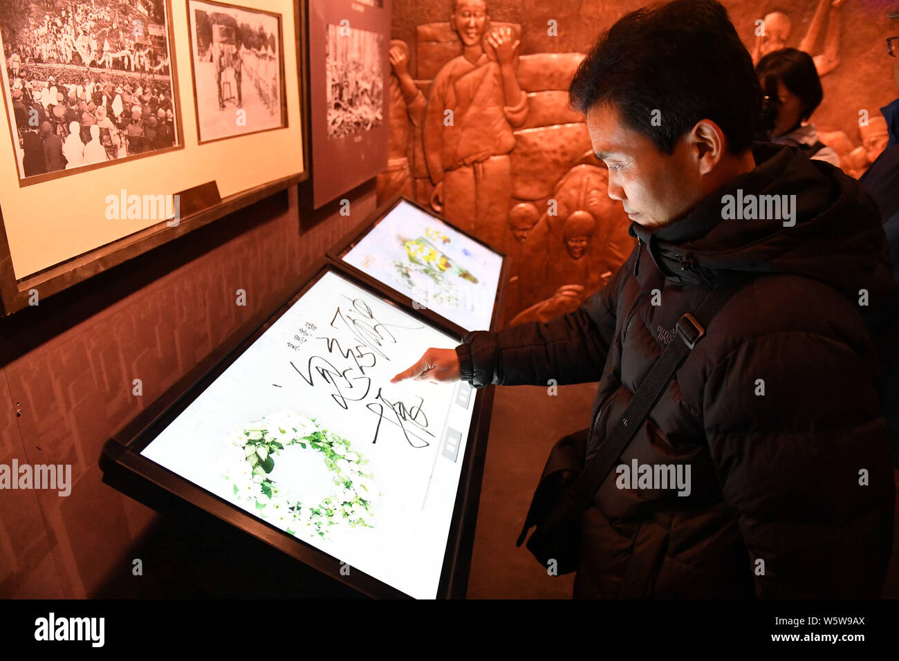 People visit the museum in commemoration of the 100th anniversary of World War I (WWI) in Qingdao city, east China's Shandong province, 11 December 20 Stock Photo