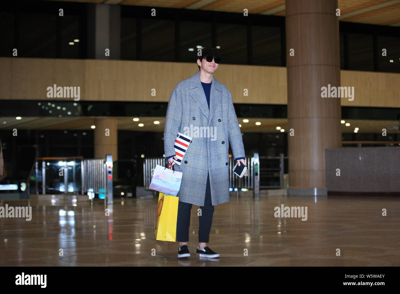 South Korean singer and rapper Lee Jun-young, commonly known as Jun, of South Korean boy band U-KISS arrives at the Gimpo International Airport before Stock Photo