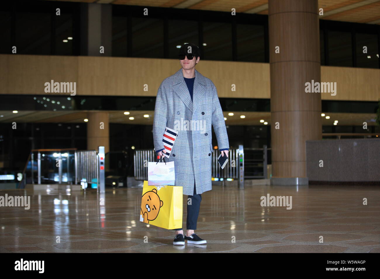 South Korean singer and rapper Lee Jun-young, commonly known as Jun, of South Korean boy band U-KISS arrives at the Gimpo International Airport before Stock Photo