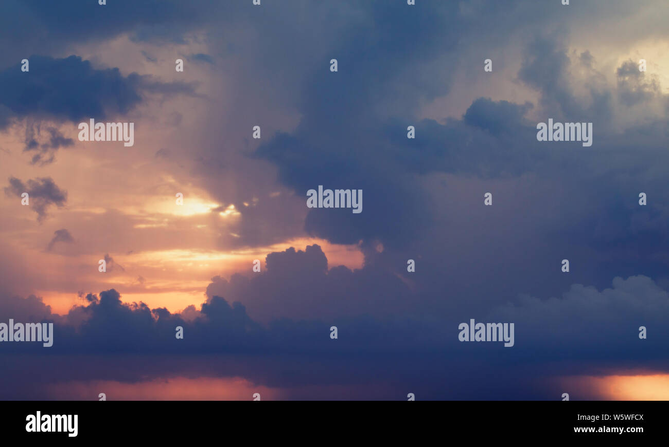 Cloudy dark sky sunset hi-res stock photography and images - Alamy