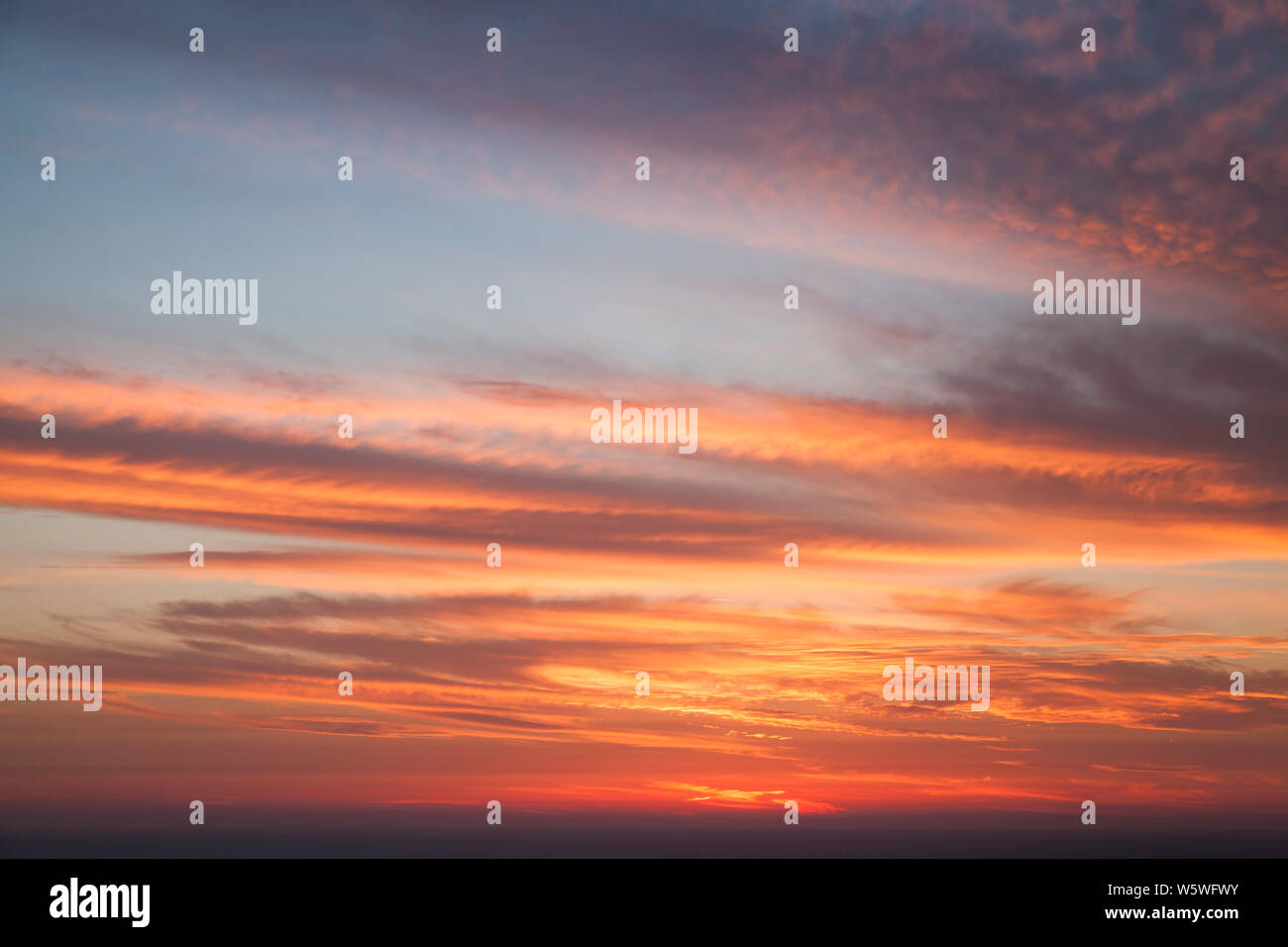Colorful cloudy tropical sky with clouds at sunset, natural background ...