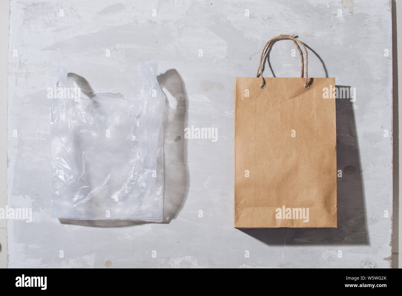 Ugly Colorful Plastic Bag Vs Brown Recyclable Eco Paper Bag Reduce Reuse And Recycle Concept Flat Lay View From Above Isolated On White Stock Photo Alamy