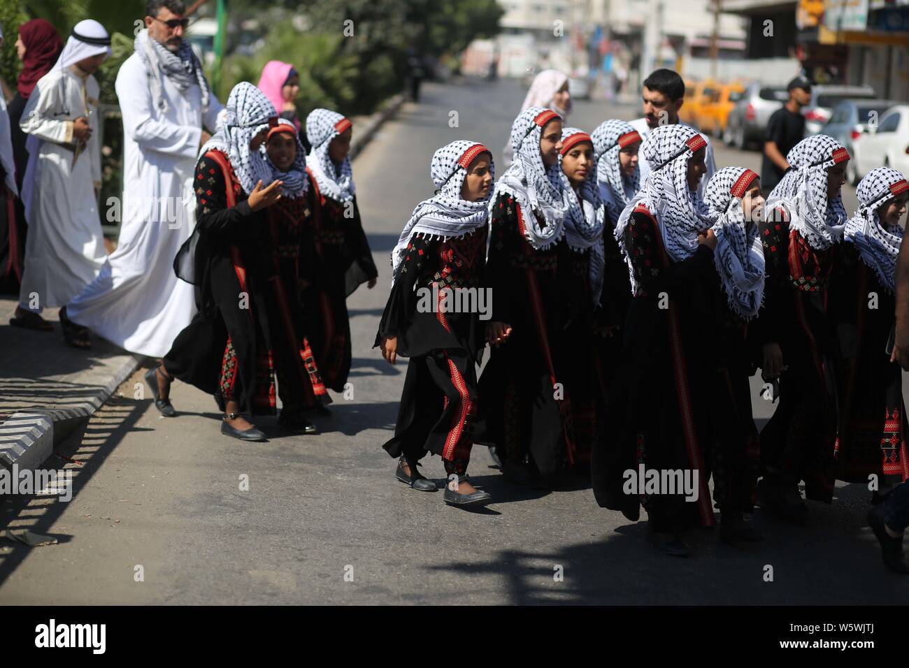 Gaza City, The Gaza Strip, Palestine. 30th July 2019. Palestinians wear ...