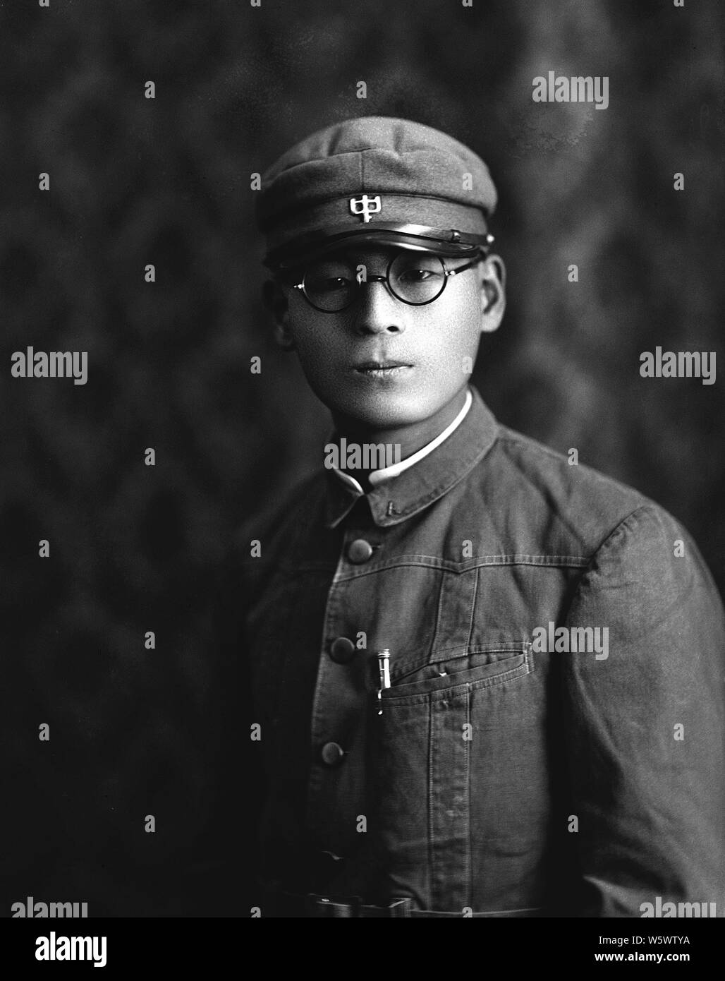 [ 1930s Japan - Portrait of Japanese Middle School Student in Uniform ] —   Middle school student in uniform.  20th century vintage glass negative. Stock Photo