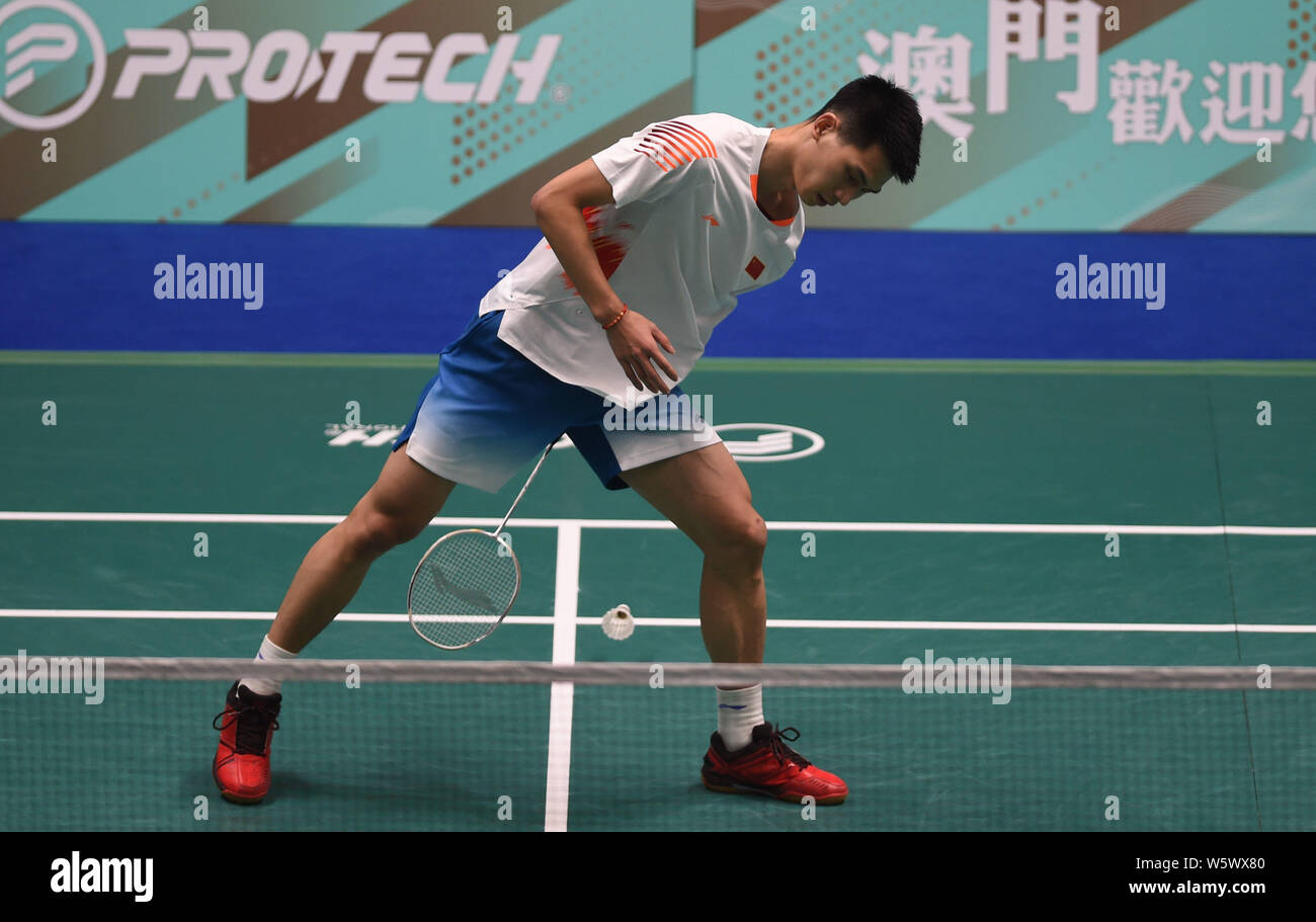Zhao Junpeng of China returns a shot to Lu Chia-hung of Chinese Taipei in  their eighth-final match of men's singles during the HSBC BWF World Tour  Mac Stock Photo - Alamy