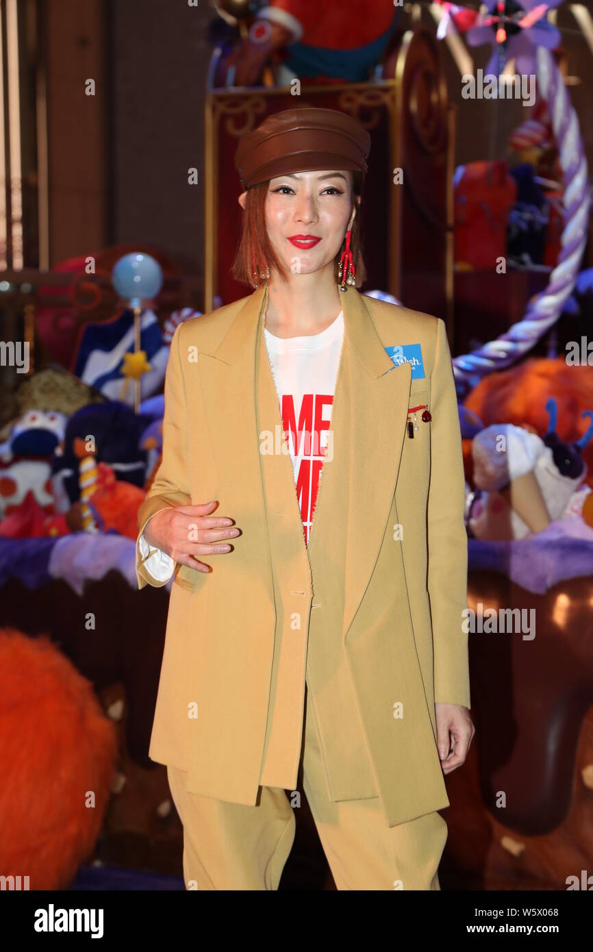 Hong kong actress singer sammi cheng hi-res stock photography and
