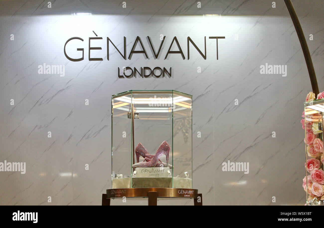A pair of luxury high heel shoes named 'Chun Can' and inlayed with 10,000 rare pink diamonds is on display at the stand of luxury company Genavant dur Stock Photo