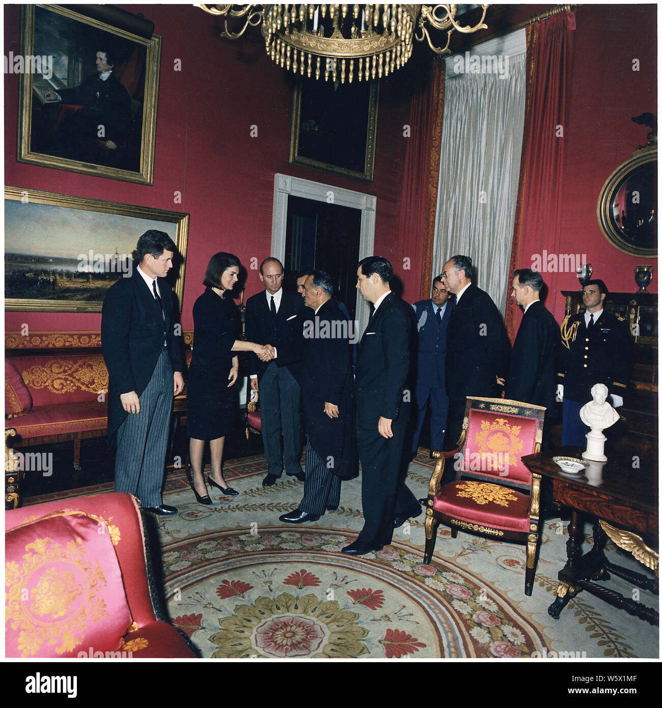 Post funeral reception. Senator Edward M. Kennedy, Mrs. Jacqueline Bouvier Kennedy, Angier Biddle Duke, reception line. White House, Red Room. Stock Photo