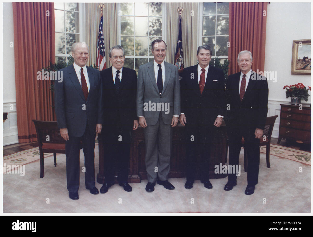 President Bush participates in a group photo with former presidents Gerald Ford, Richard Nixon, Ronald Reagan and Jimmy Carter in the replica of the Oval Office at the Dedication of the Ronald Reagan Presidential Library in Simi Valley, California Stock Photo