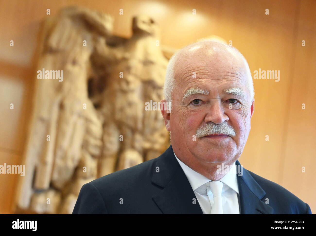 Karlsruhe, Germany. 30th July, 2019. Peter Gauweiler, as a complainant in the Federal Constitutional Court, is waiting for the start of oral proceedings on extensive purchases of government bonds by the European Central Bank (ECB). Credit: Uli Deck/dpa/Alamy Live News Stock Photo