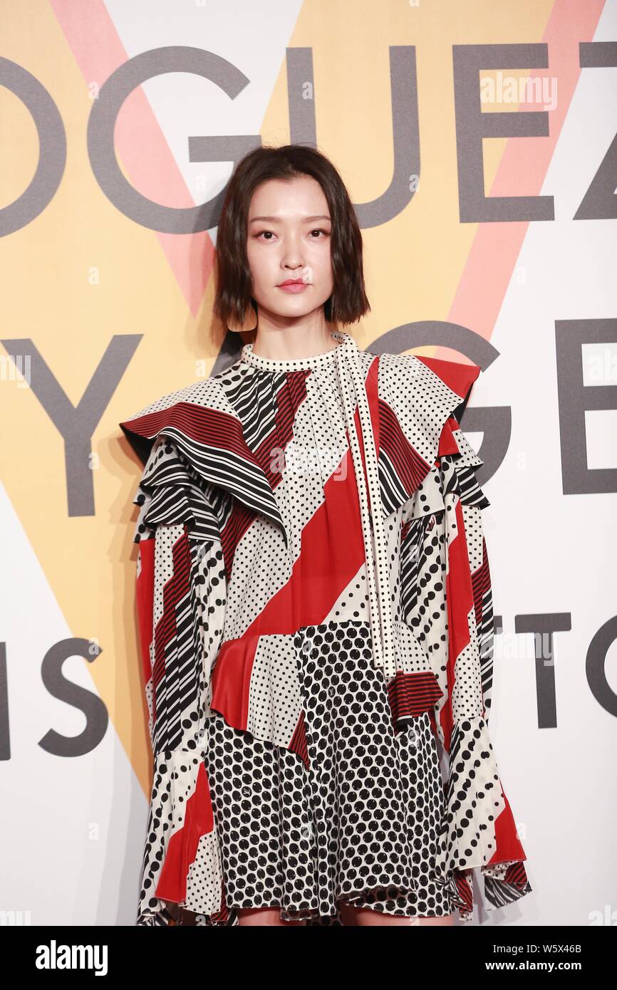 Chinese model Du Juan poses as she attends the Louis Vuitton Volez,  Voguez, Voyagez exhibition in Shanghai, China, 15 November 2018 Stock  Photo - Alamy