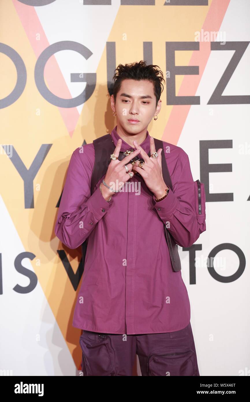 Chinese Singer Actor Kris Yifan Attends Louis Vuitton Fashion Show