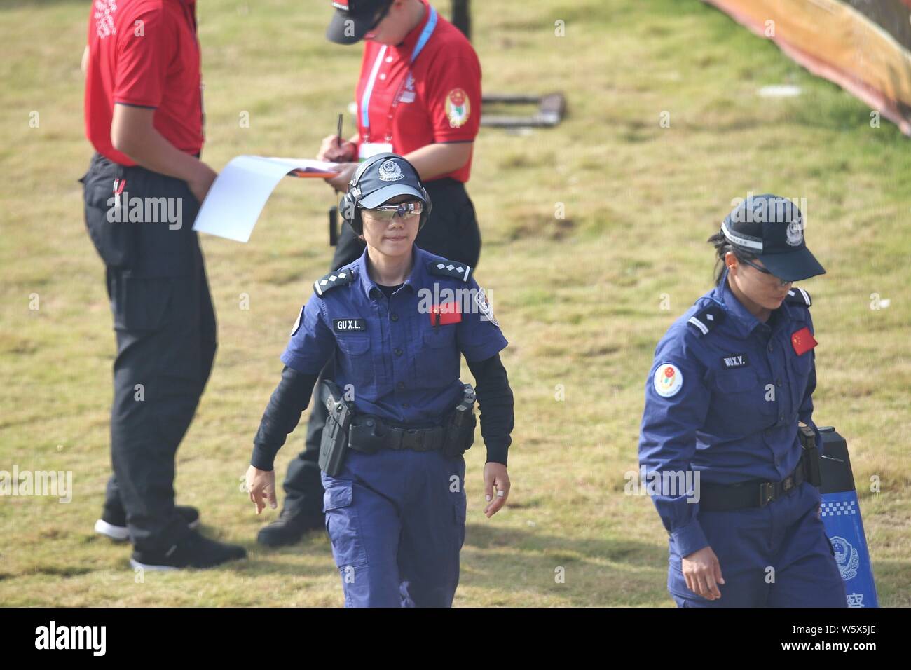 Chinese police officers compete in the 2nd USIP World Police Service Pistol Shooting Competition in Foshan city, south China's Guangdong province, 14 Stock Photo