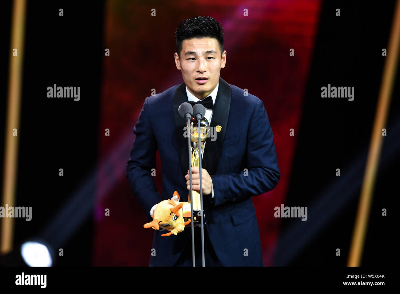 Chinese football player Wu Lei of Shanghai SIPG speaks after winning