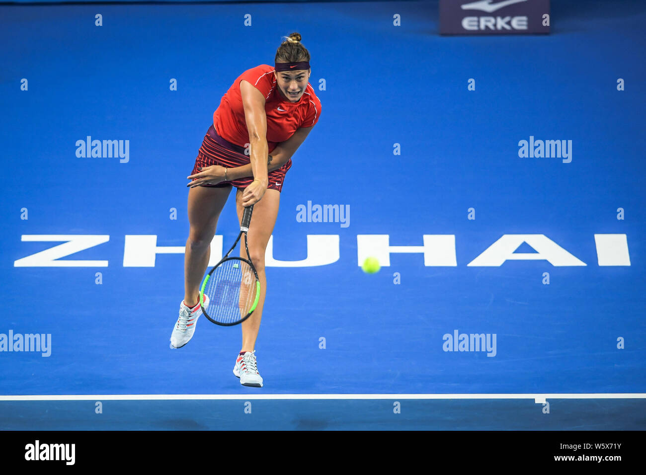 Aryna Sabalenka of Belarus returns a shot to Caroline Garcia of France