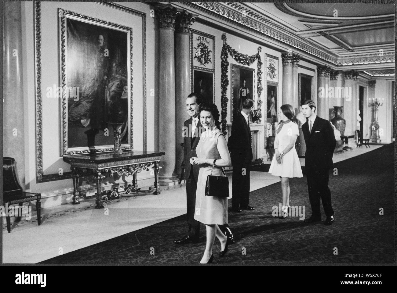 President Nixon visiting Buckingham Palace with Britain's royal family; Scope and content:  Pictured: Richard M. Nixon, Queen Elizabeth II, Prince Phillip, Princess Anne, Prince Charles. Subject: European Trip - 1969. Stock Photo