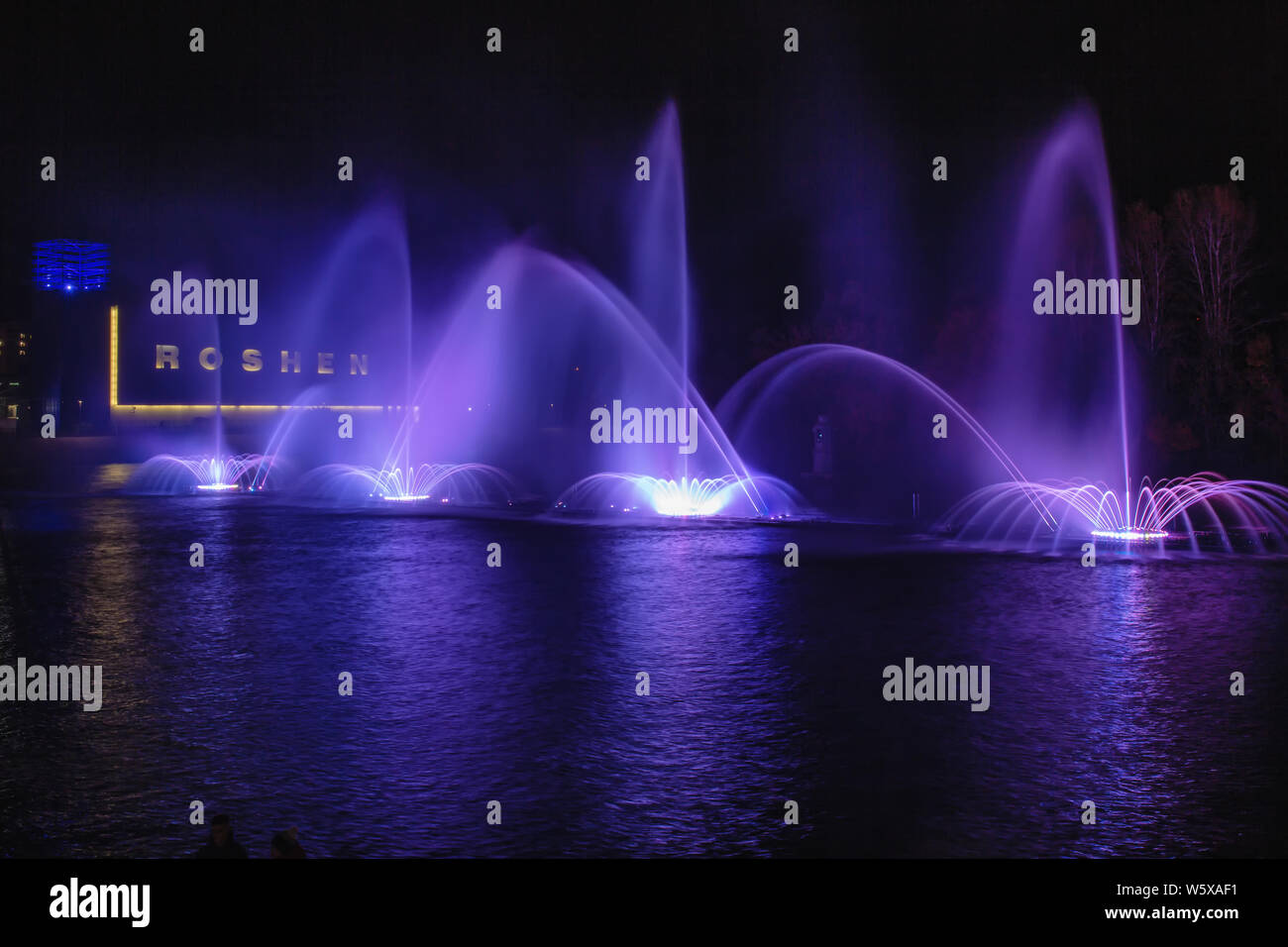Vinnytsia, Ukraine- September 21, 2018: Musical fountain with laser animations. Night laser show on the musical fountain Roshen in Vinnitsa, Ukraine Stock Photo