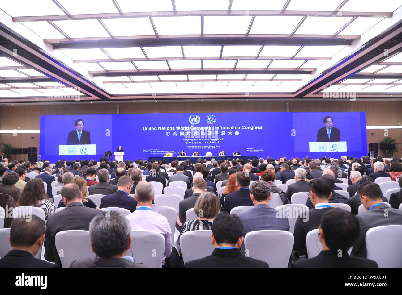 Guests attend the opening ceremony for the United Nations World Geospatial Information Congress (UNWGIC) in Deqing county, Huzhou city, east China's Z Stock Photo