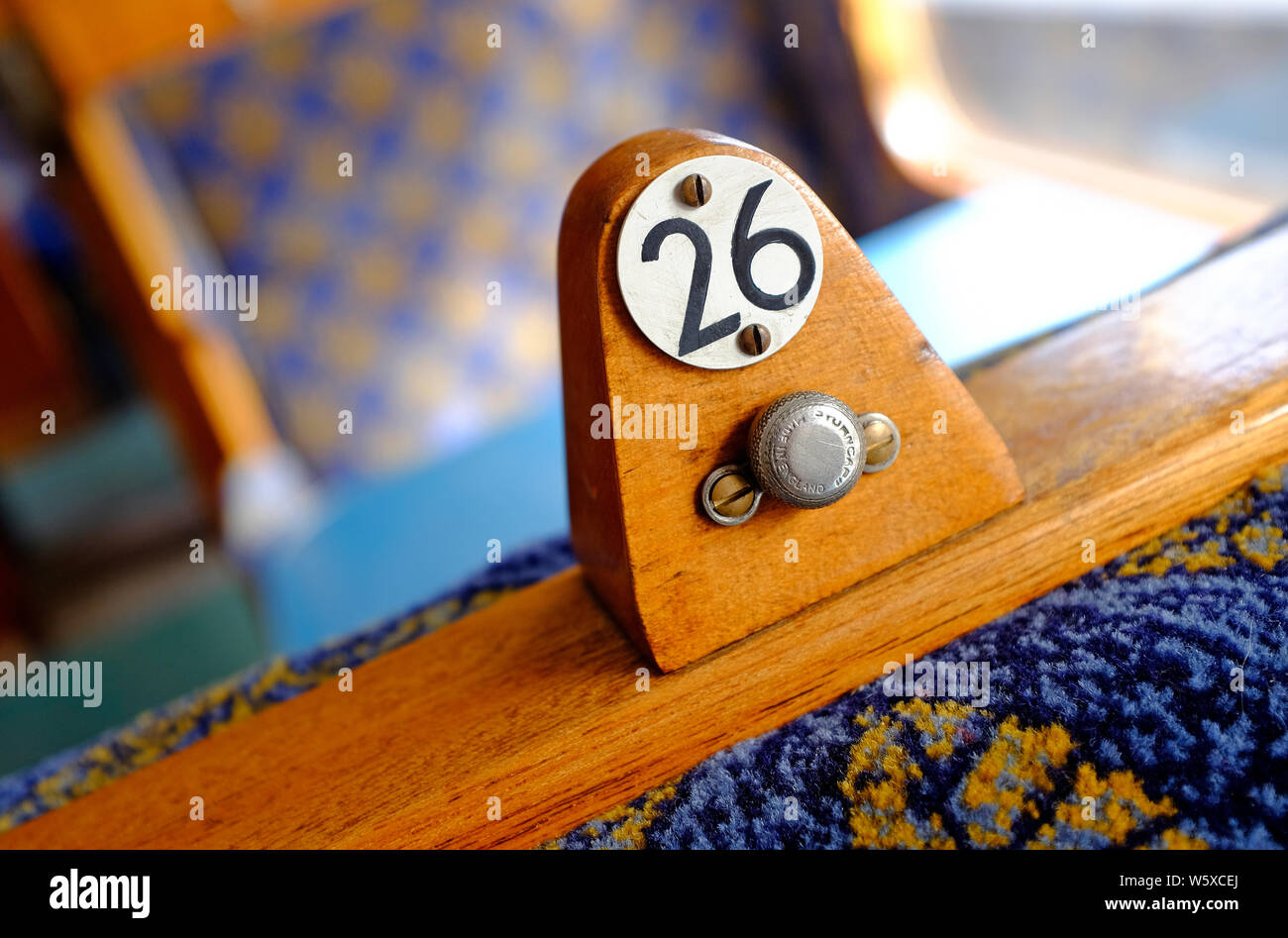 number 26 numeral on old railway carriage seat, sheringham, north norfolk, england Stock Photo